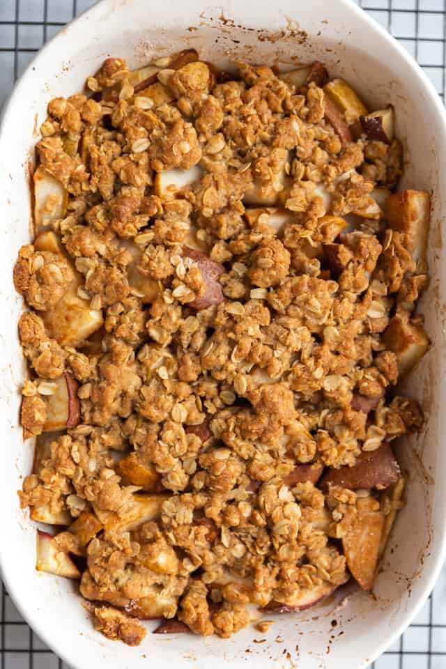 overhead view of pear crisp in a white pan