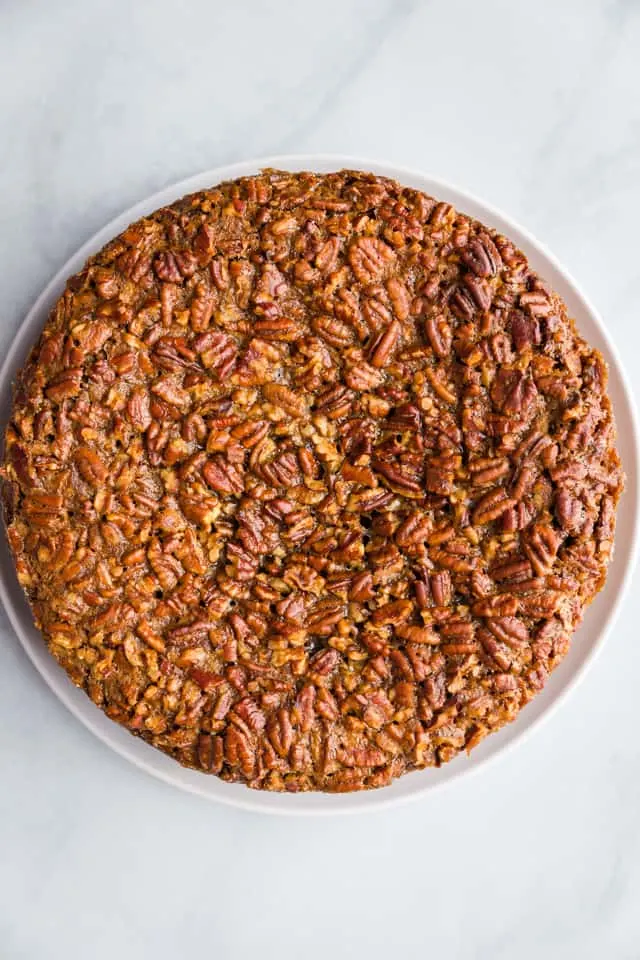 overhead view of baked pecan pie cheesecake