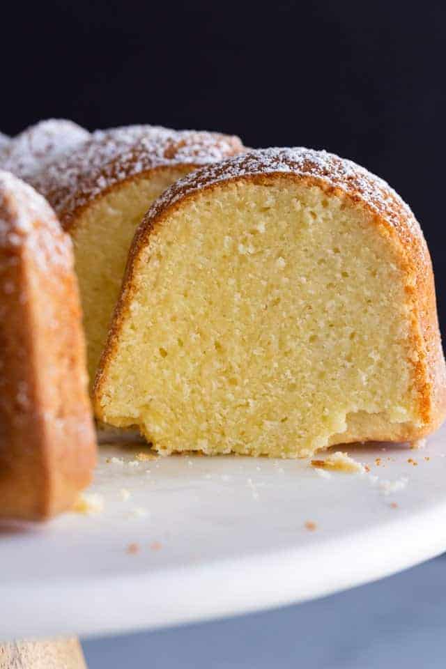 side view of a slice cut out of sour cream pound cake
