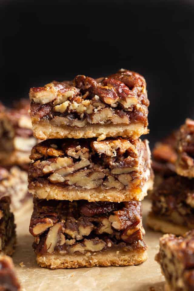 side view of a stack of pecan pie bars
