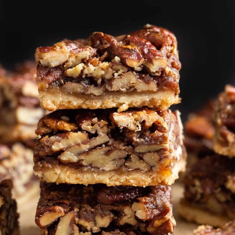 side view of a stack of pecan pie bars