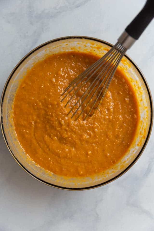 overhead view of sweet potato pie filling in a glass bowl
