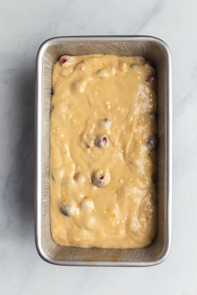 overhead view of unbaked cranberry walnut bread