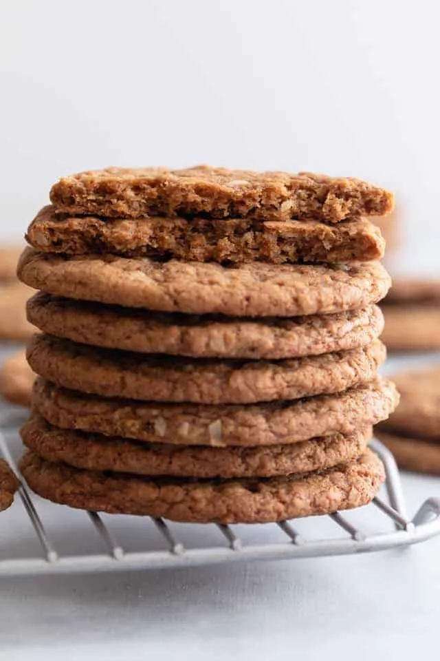 coconut cookies stacked on wire rack