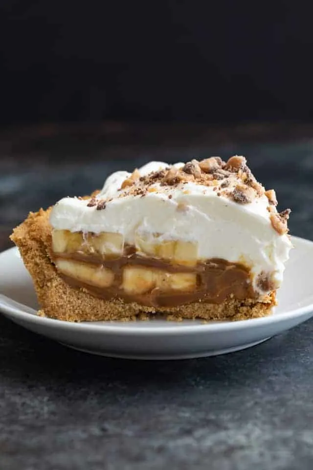 Slice of Banoffee Pie on a white plate