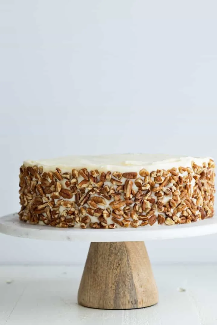 carrot cake on marble cake stand