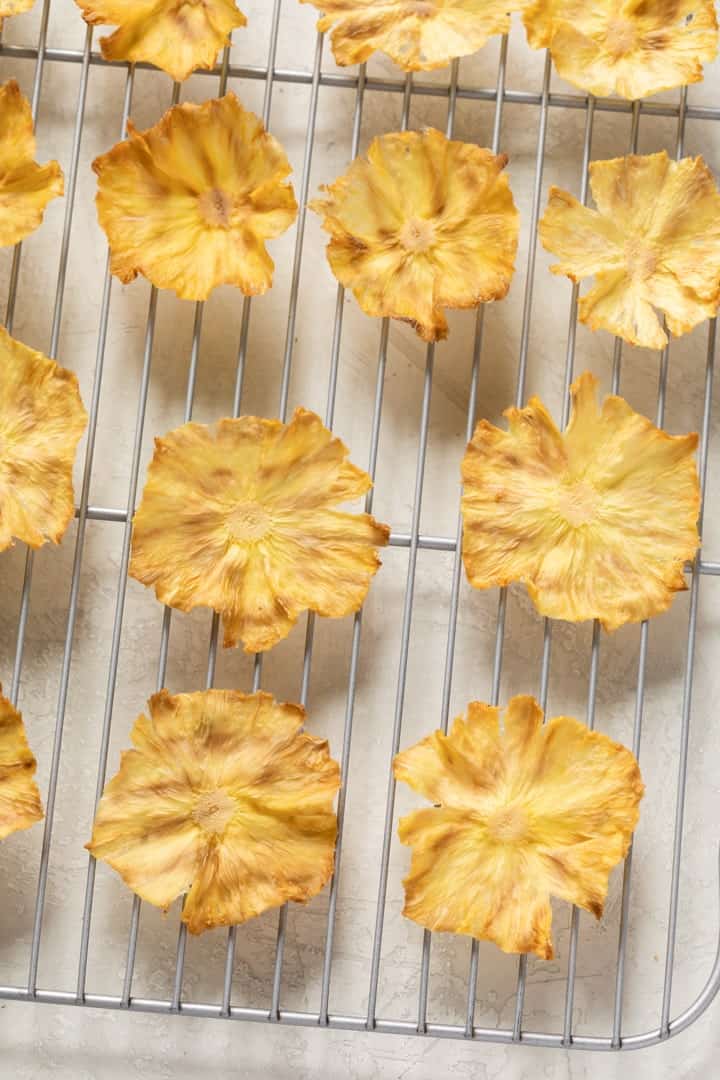 dried pineapple flowers on a cooling rack