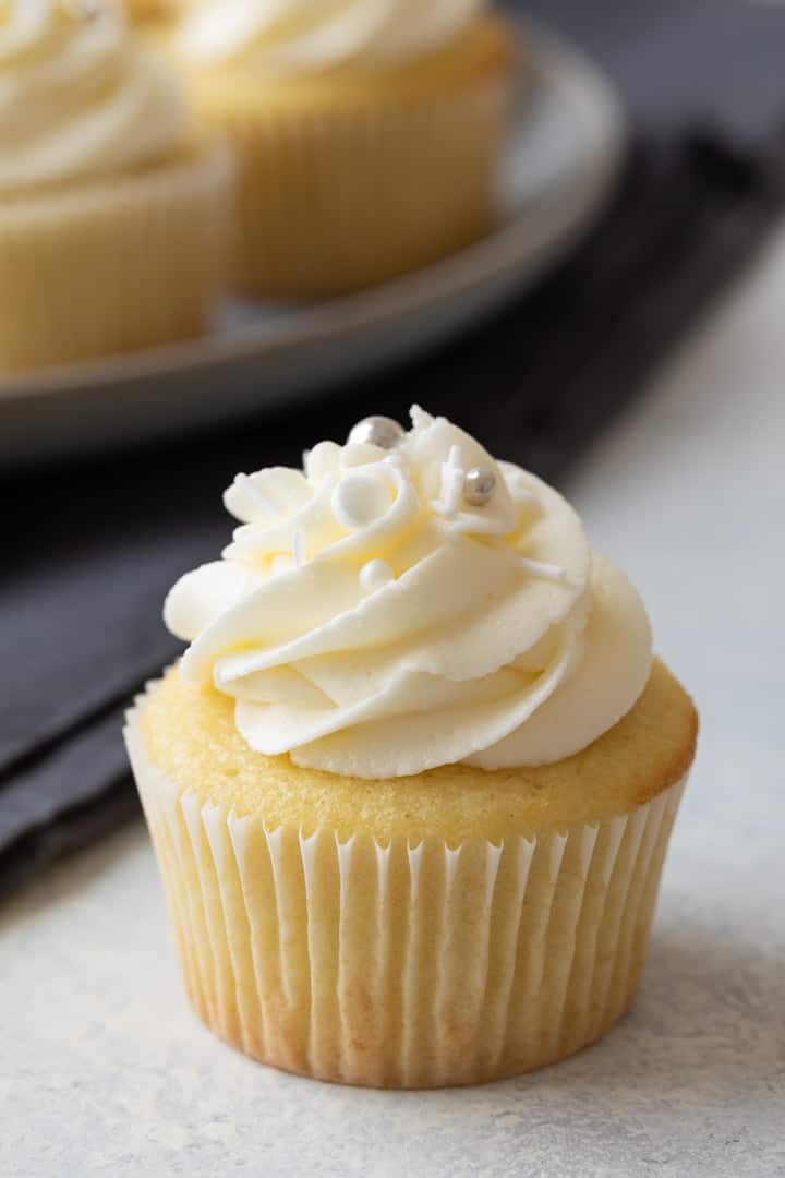 close up view of the best vanilla cupcakes with vanilla buttercream