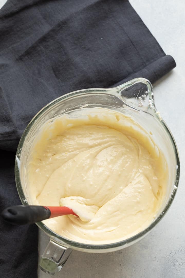 vanilla cupcake batter in a glass bowl