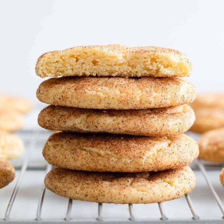 stack of snickerdoodles on a wire rack