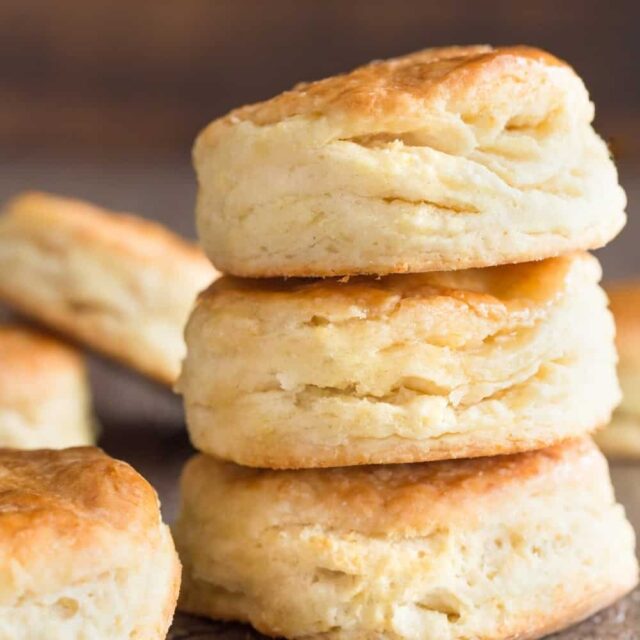 Stack of freshly baked cream cheese biscuits, ready to be eaten
