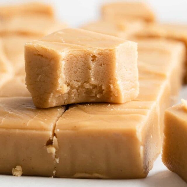Peanut butter fudge with a bite taken out.