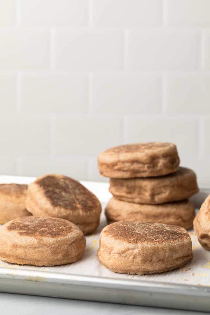 100% whole wheat English muffins on a baking sheet