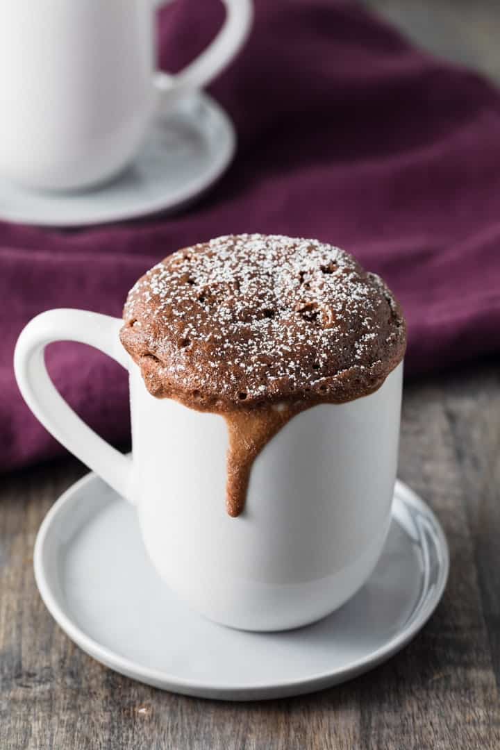 side view of Nutella mug cake in a white cup
