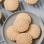 overhead of shortbread cookies on a grey plate