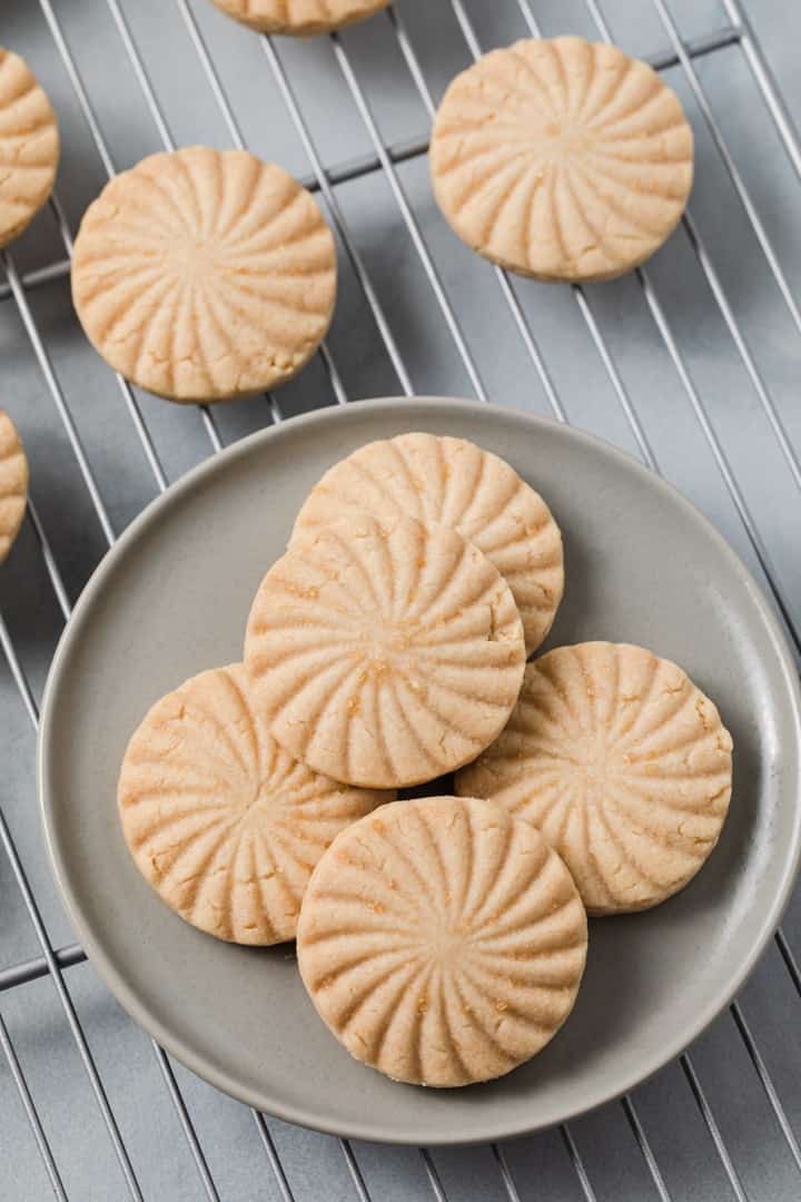 overhead of shortbread cookies on a grey plate