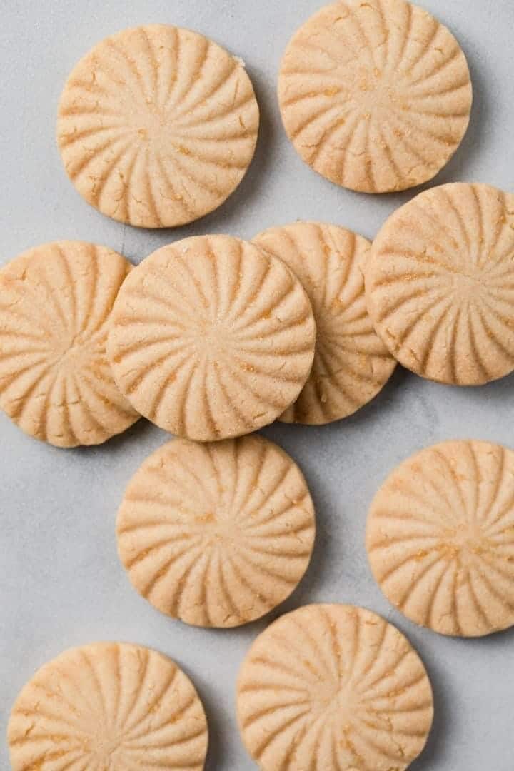 overhead of shortbread cookies scattered on tabletop