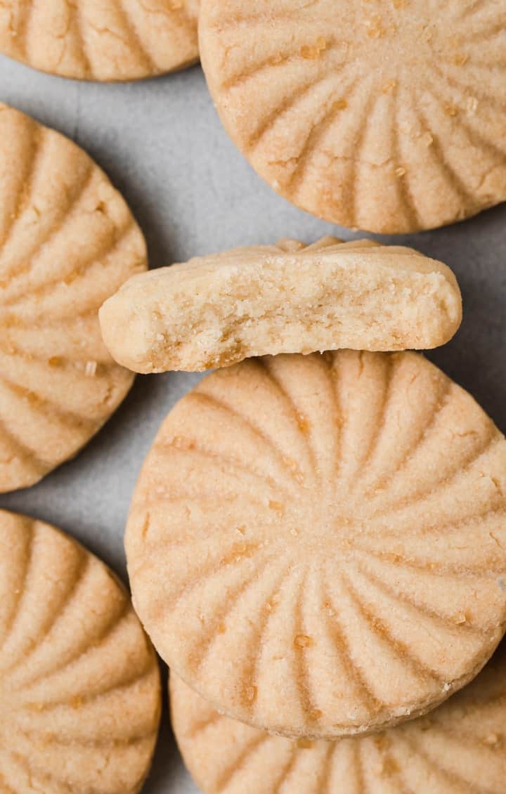 close up of broken shortbread cookie so the inside texture is visible