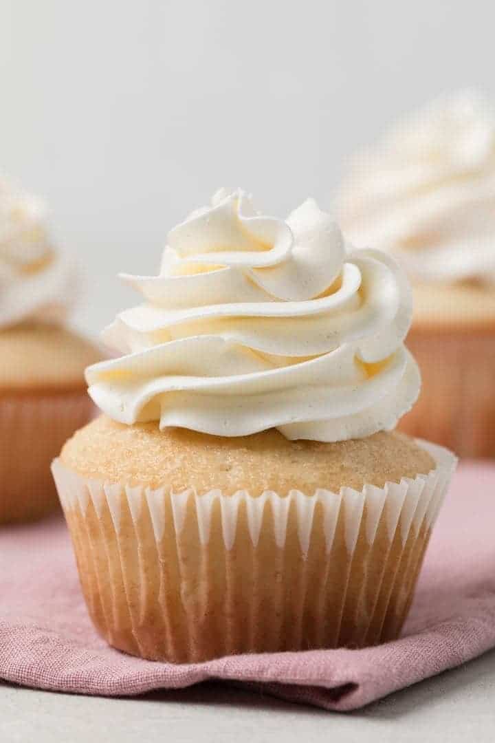 swill buttercream swirled on top of cupcake