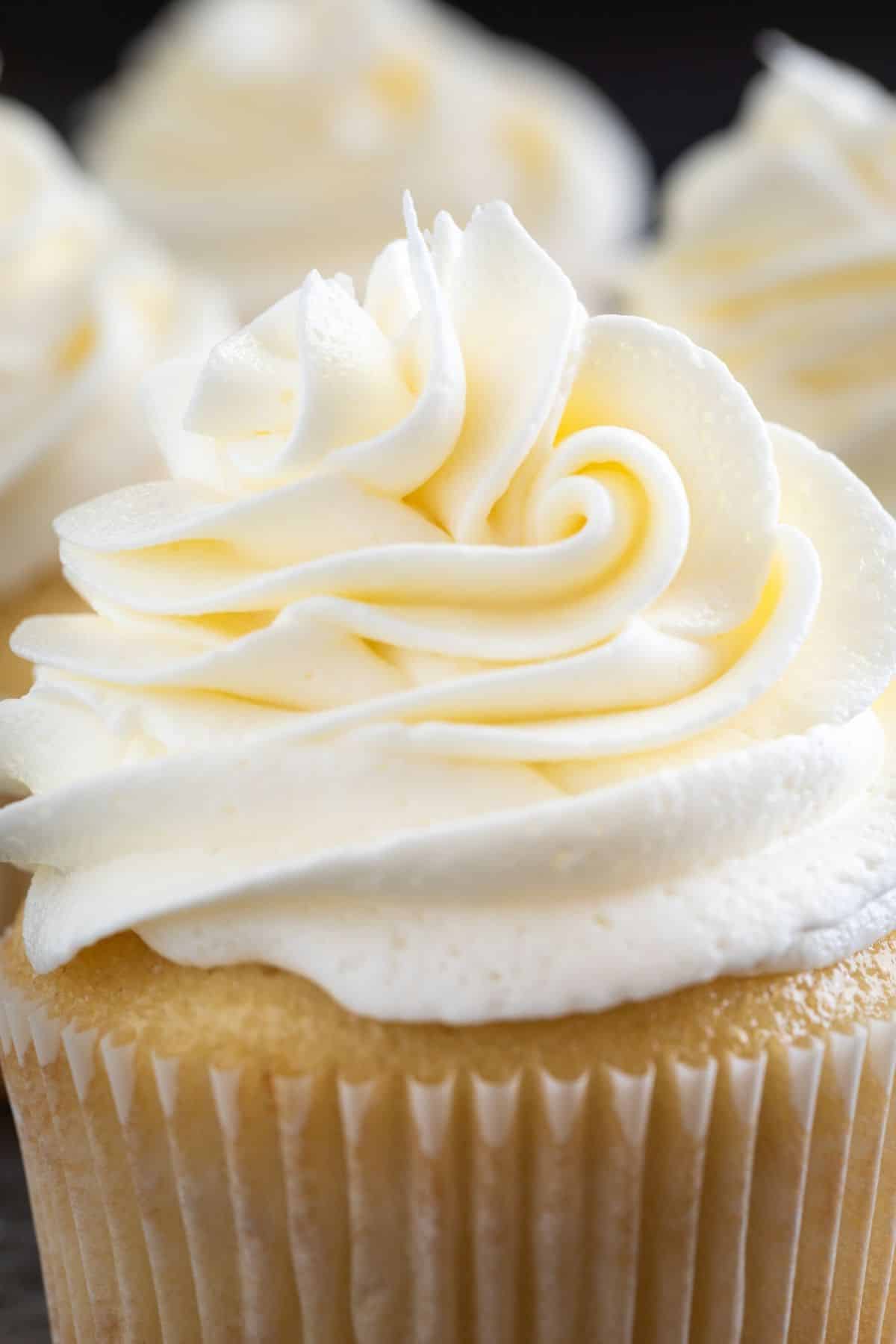 Swirl of vanilla buttercream closeup.