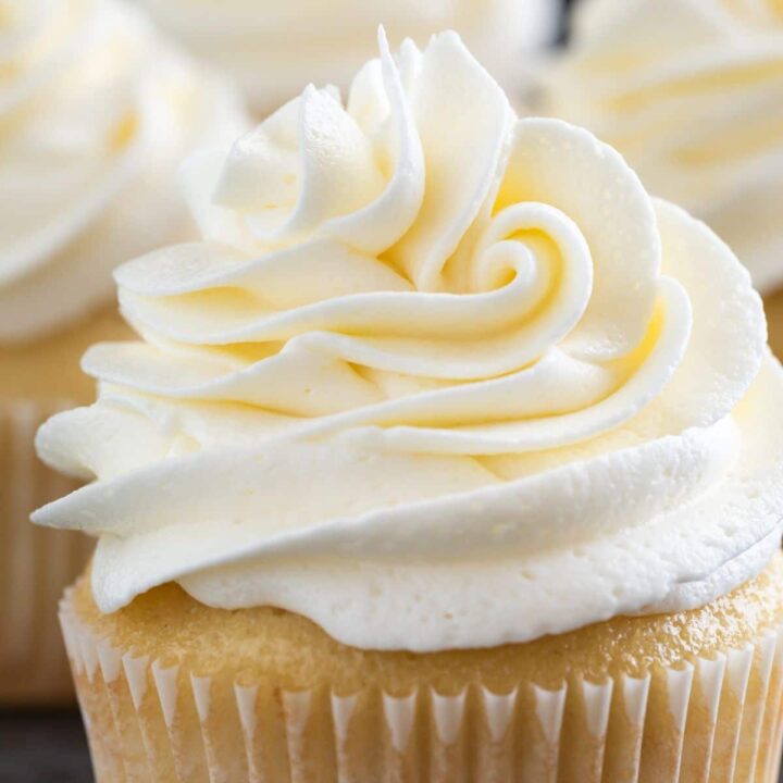 Swirl of Vanilla Buttercream Frosting on a yellow cupcake