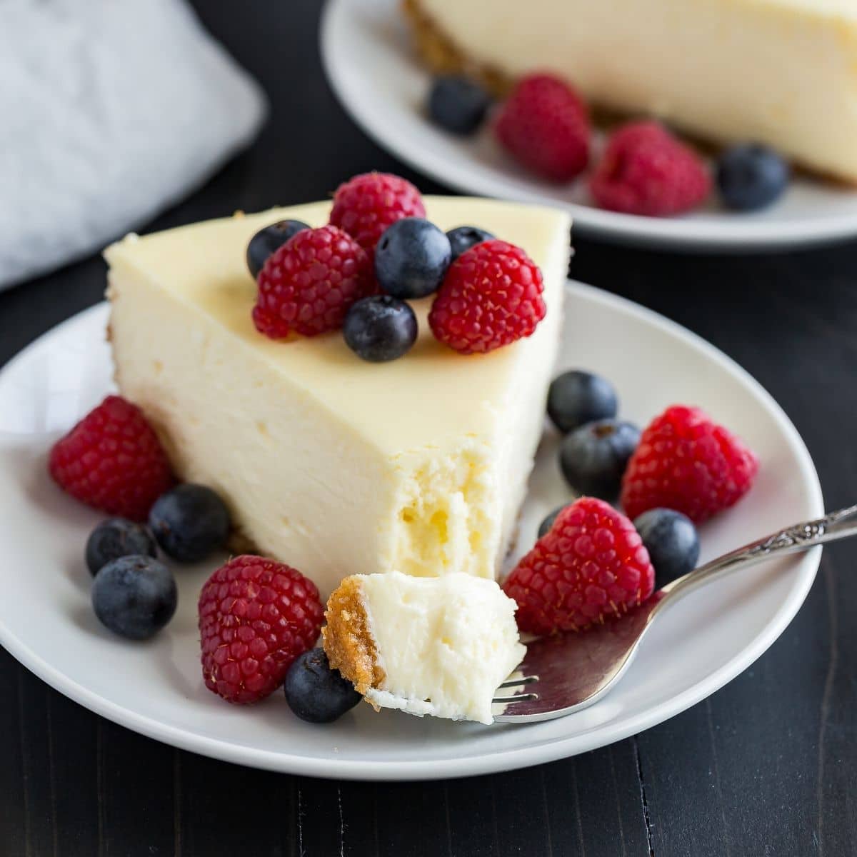 https://www.bakedbyanintrovert.com/wp-content/uploads/2020/04/How-to-Make-the-Best-Cheesecake-Recipe-Image.jpg