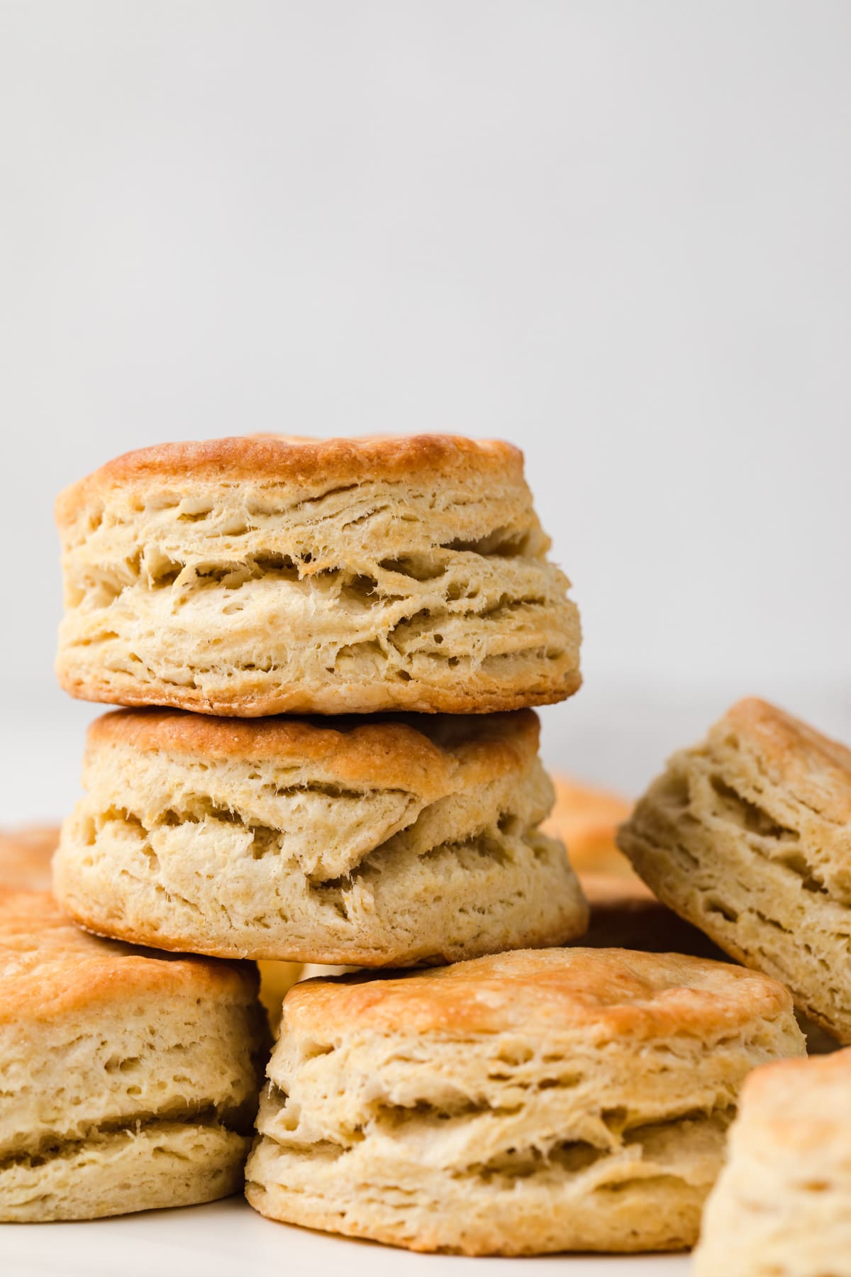 two biscuits stacked on top of single layer of biscuits