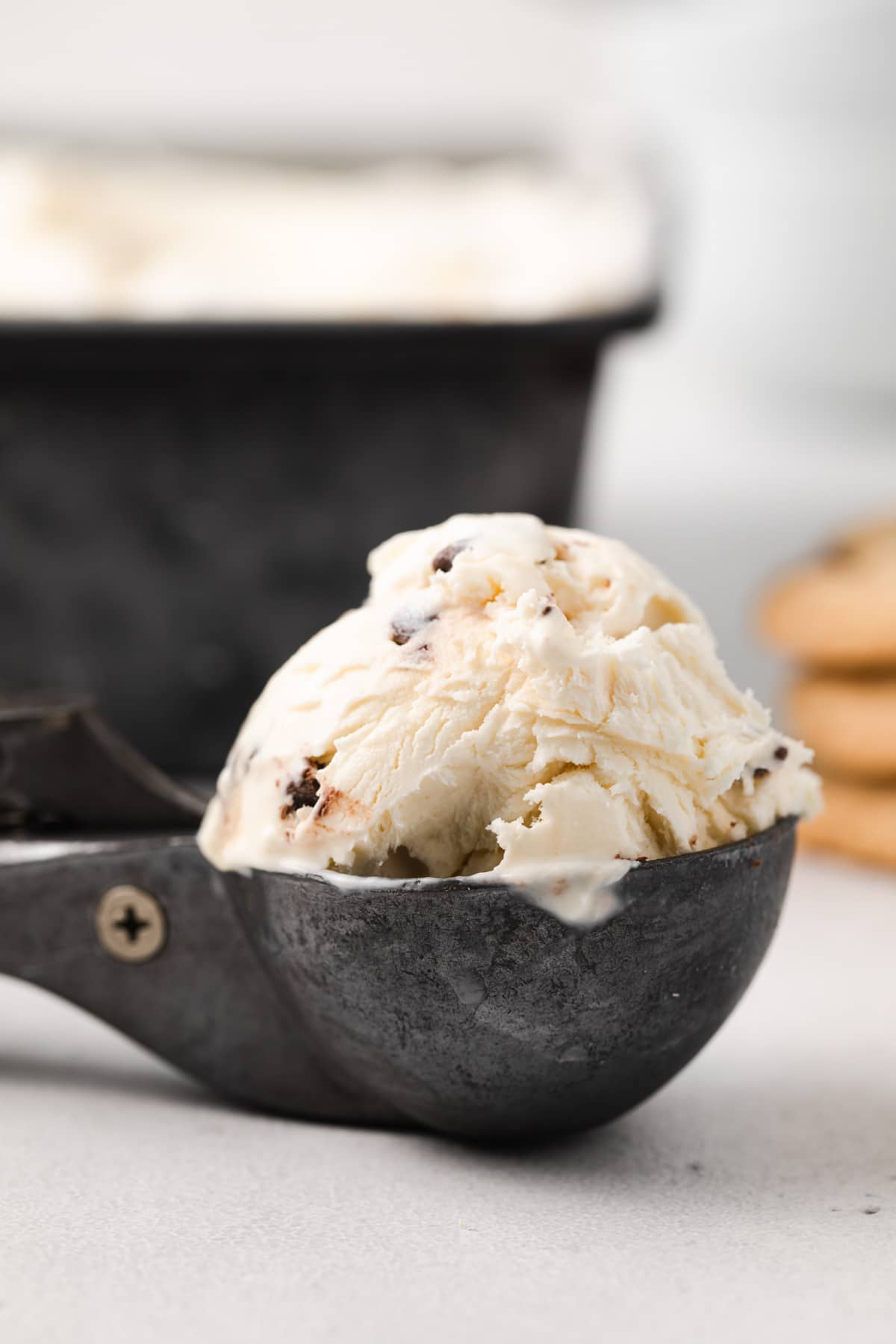 side view of scoop filled with edible cookie dough ice cream