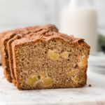 front view of open face apple bread on marble slab