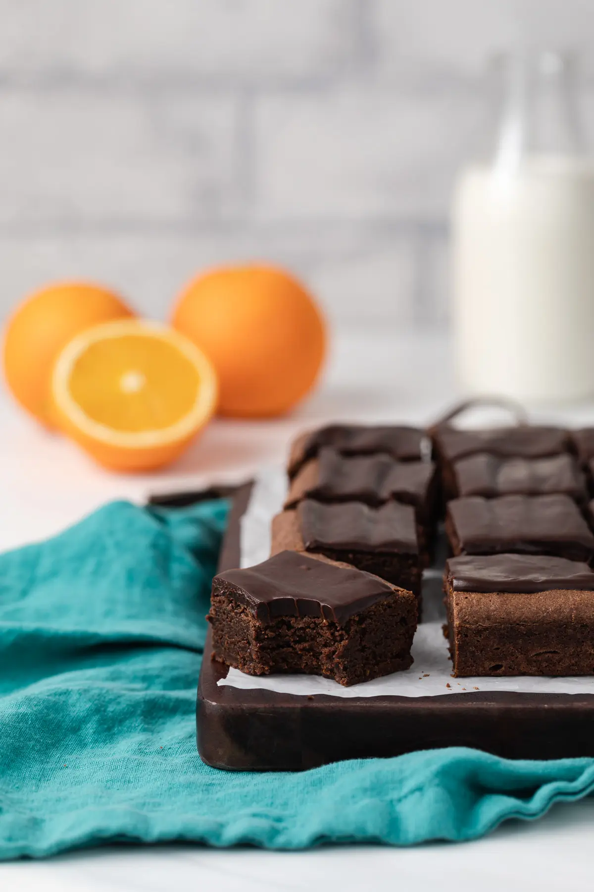 chocolate orange brownies with a bite taken out of one