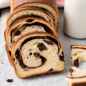 up close view of sliced cinnamon raisin bread with the interior visible