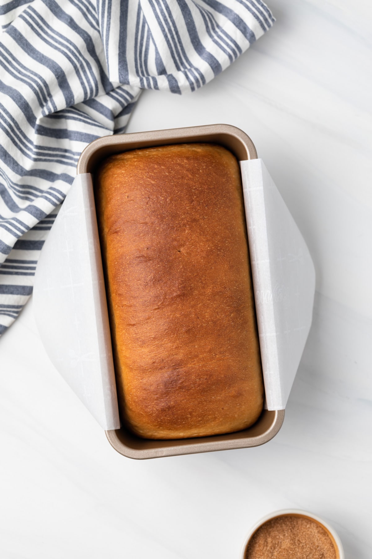 overhead of baked bread in loaf pan