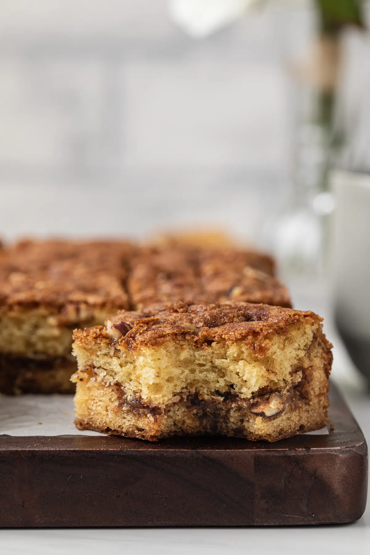 slice of cinnamon coffee cake with bite taken out