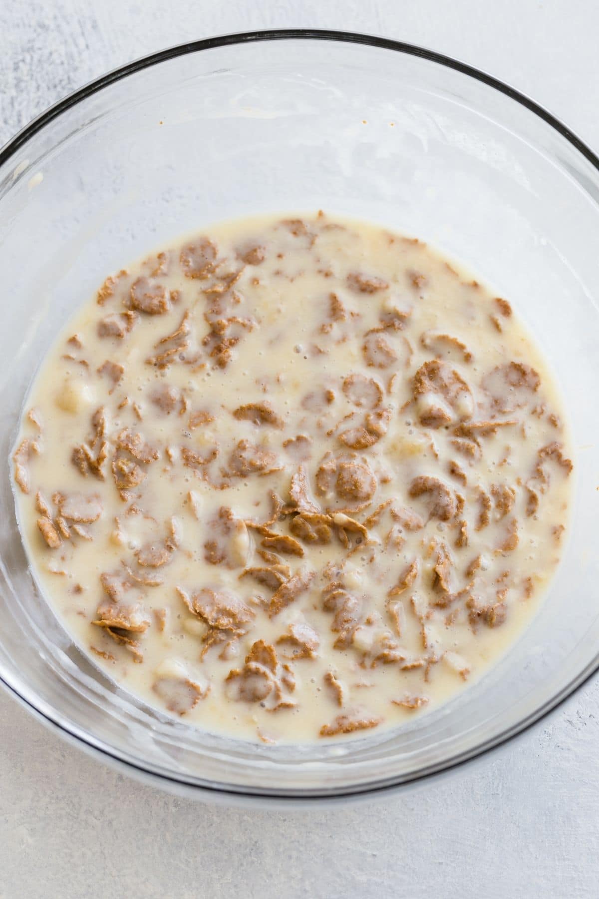 bran cereal soaking in milk mixture for muffins