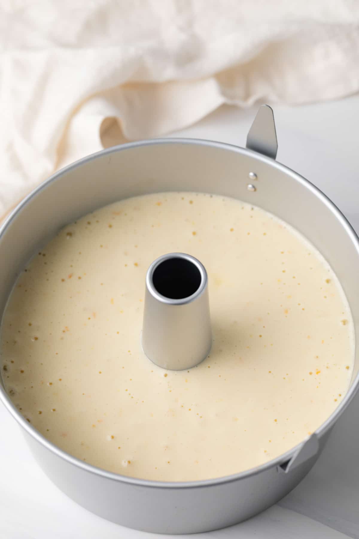 unbaked chiffon cake in tube pan