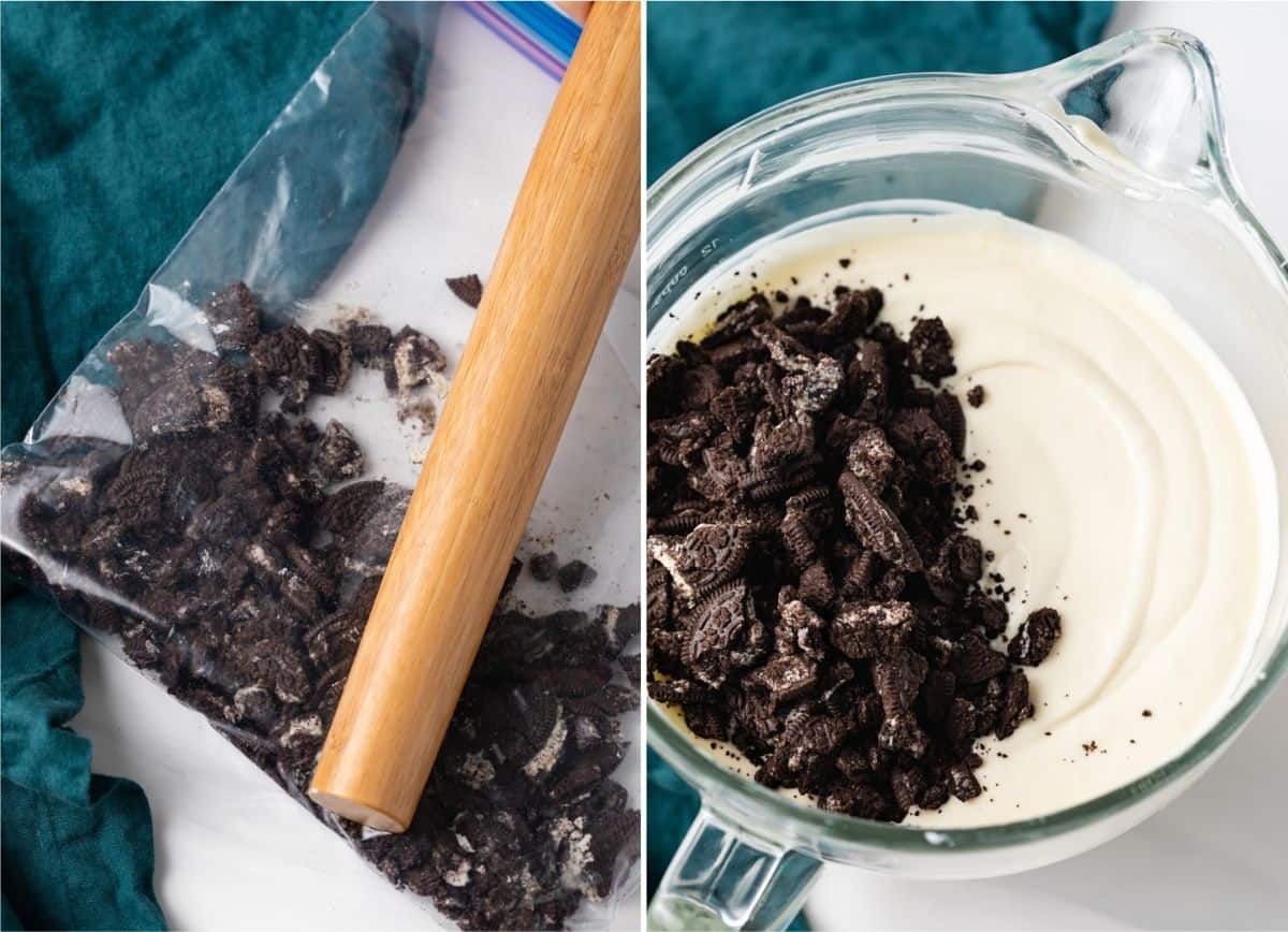 oreos broken up in a ziptop bag with a wooden rolling pin next to crushed oreos on top of cheesecake batter in a glass mixing bowl