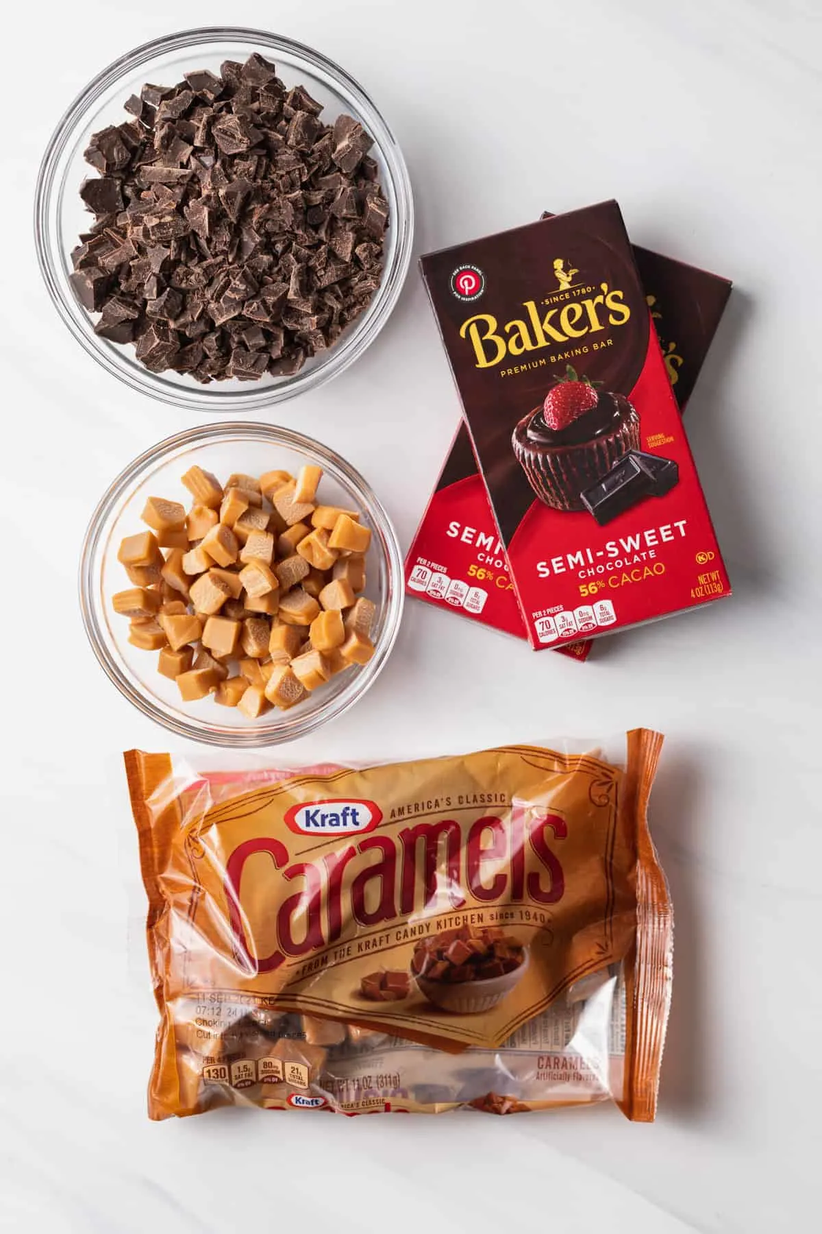 caramel and chocolate in glass bowls and original packages