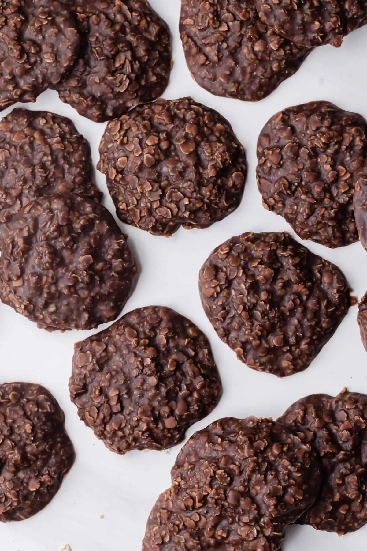 No bake oatmeal cookies on white background.