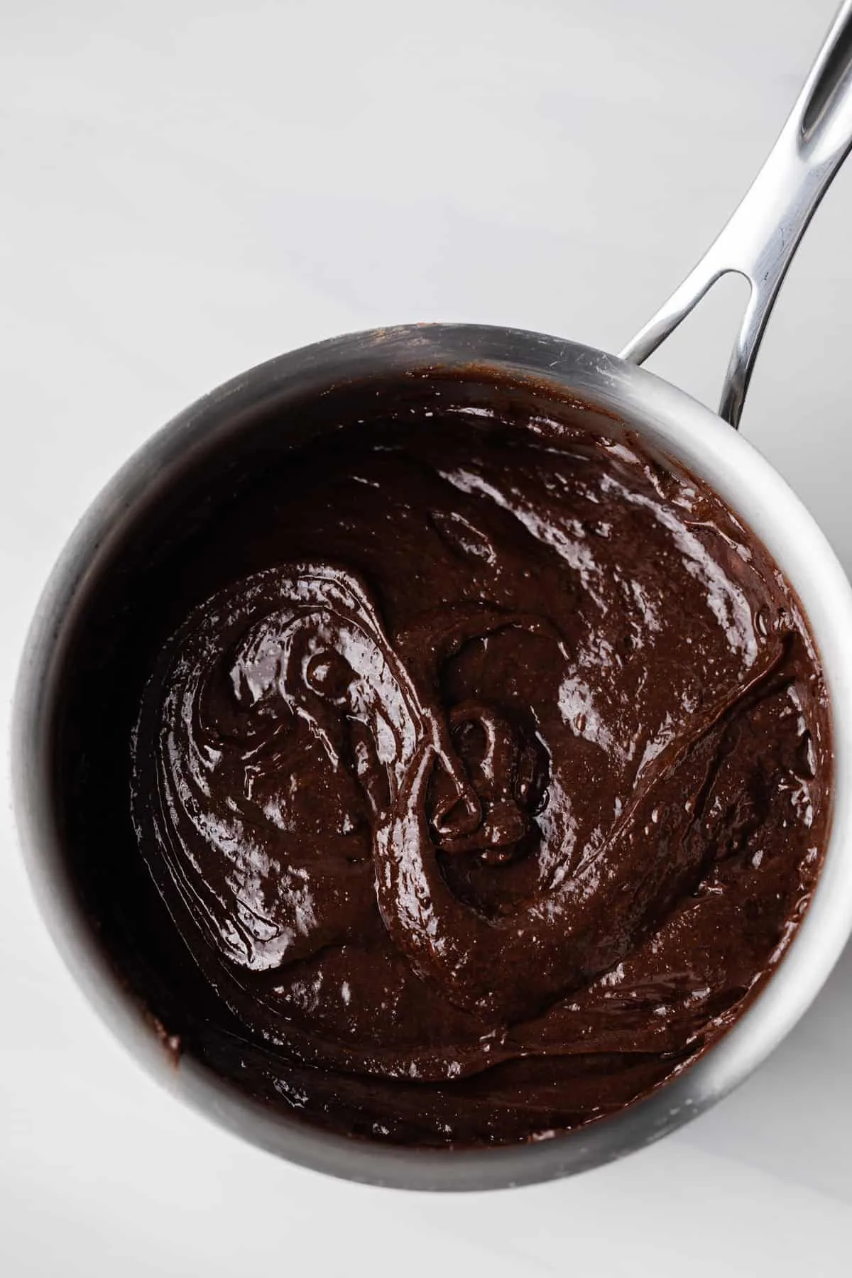 Brownie batter in a pot.