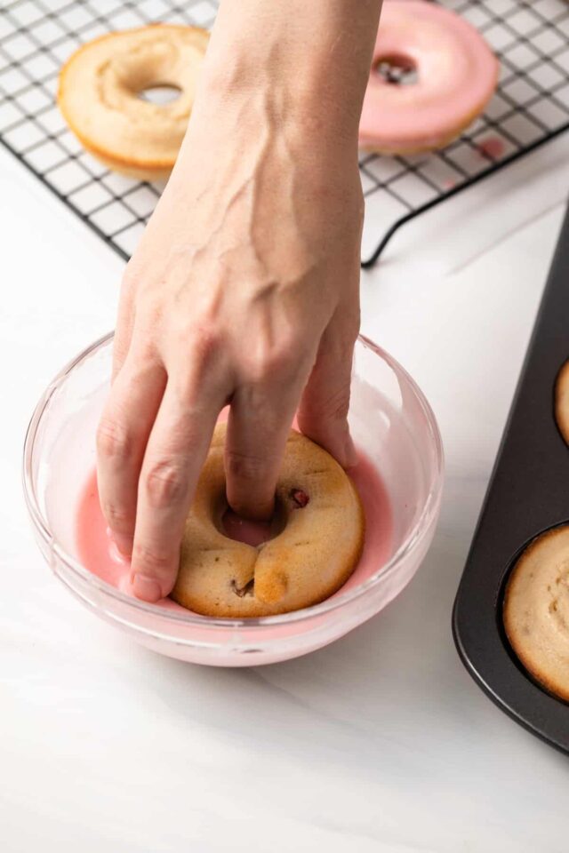 Bake donut dipped in strawberry glaze