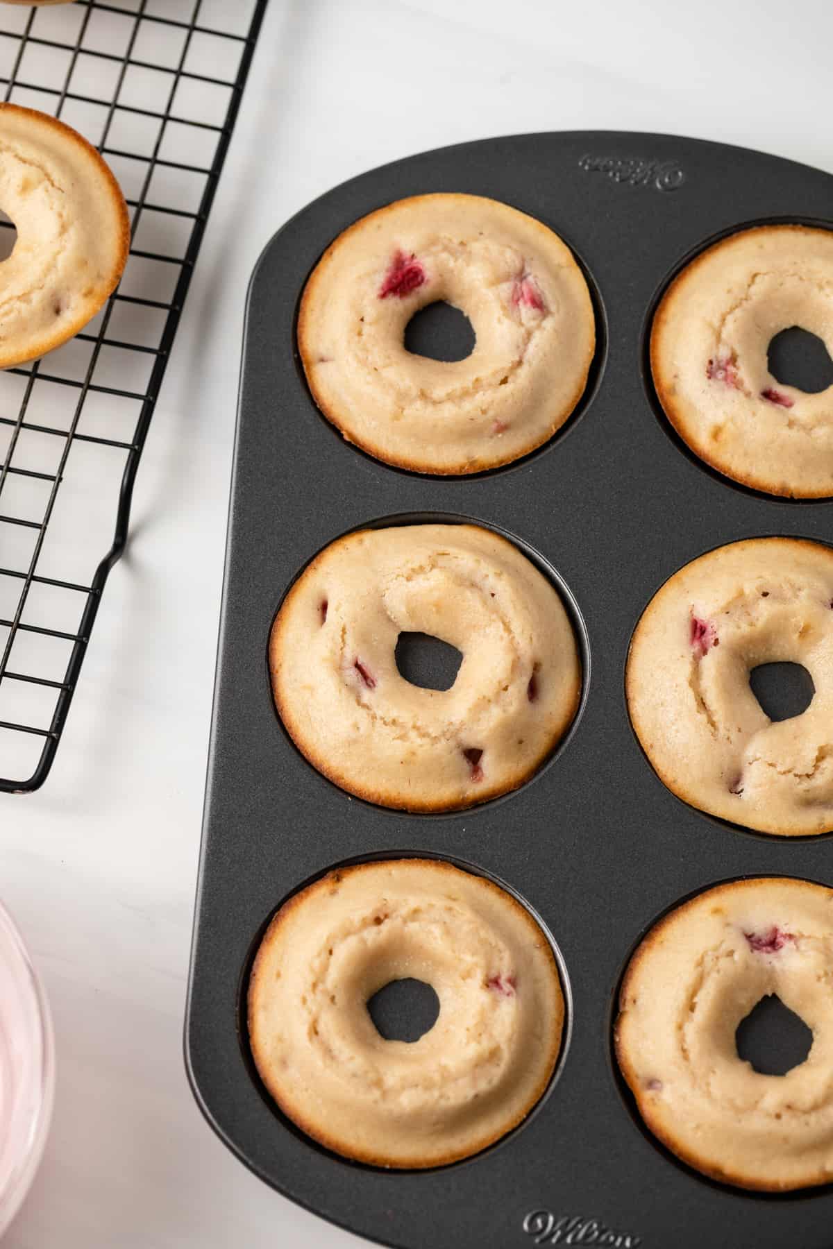 Freshly baked strawberry donuts