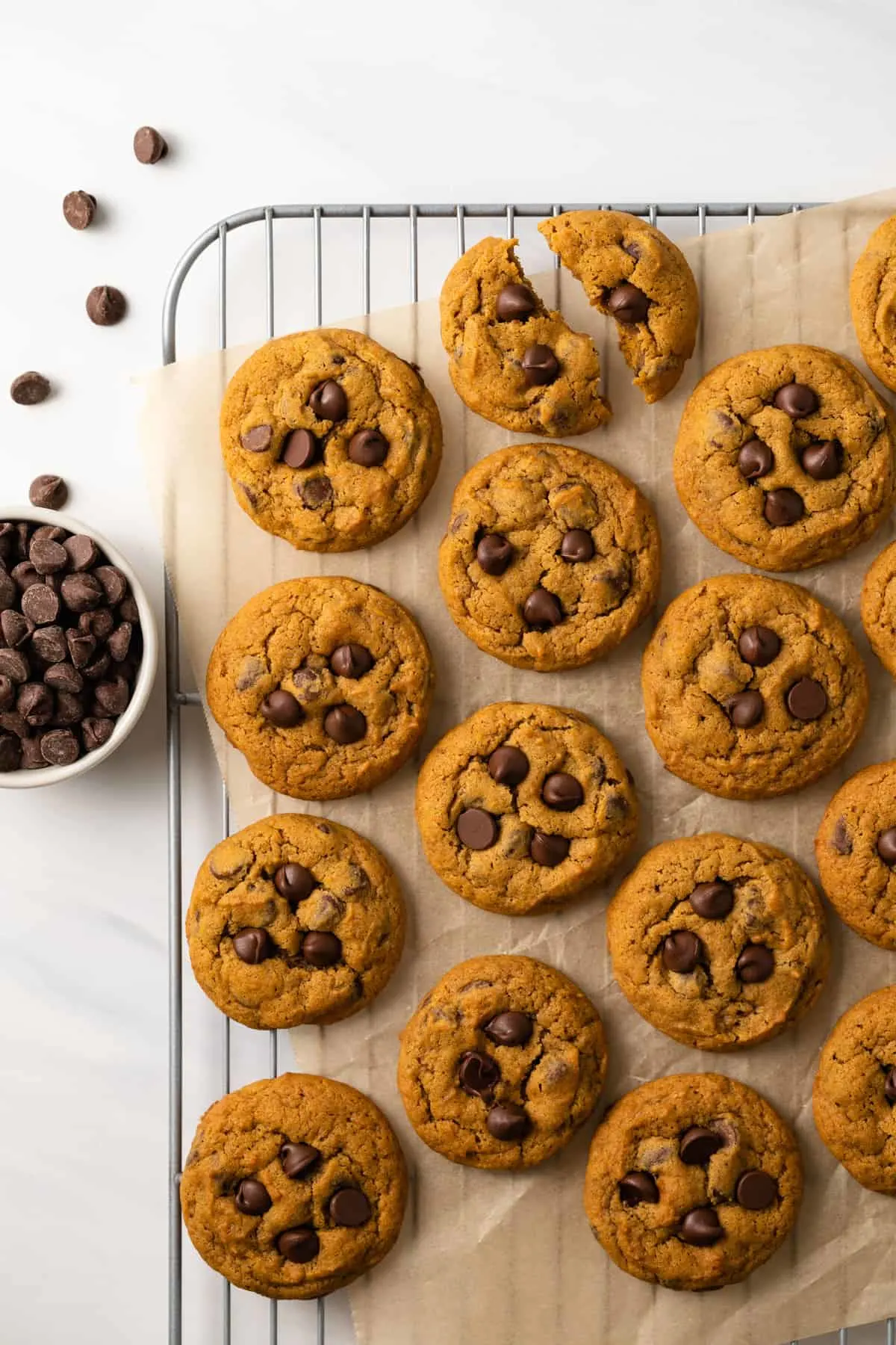 Overhead view of pumpkin chocolate chip cookies on a cooling rack