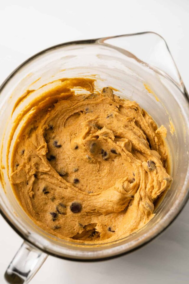 Pumpkin chocolate chip cookie dough in a mixing bowl