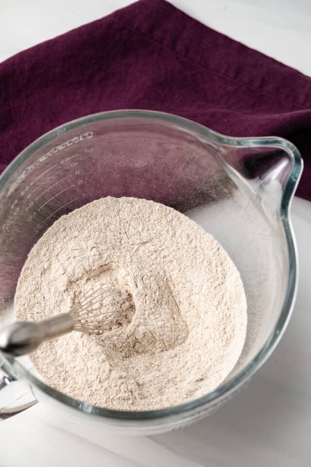 Bowl of flour with whisk