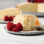 Slice of Irish tea cake with fork taking a bite out.