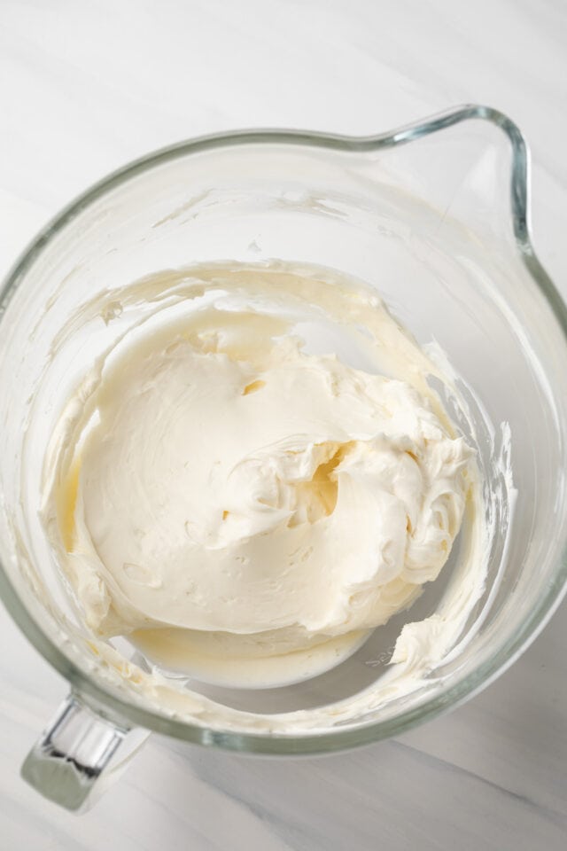 Cream cheese creamed in glass bowl.