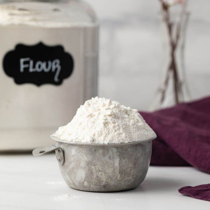 Heat treated flour in a measuring cup.