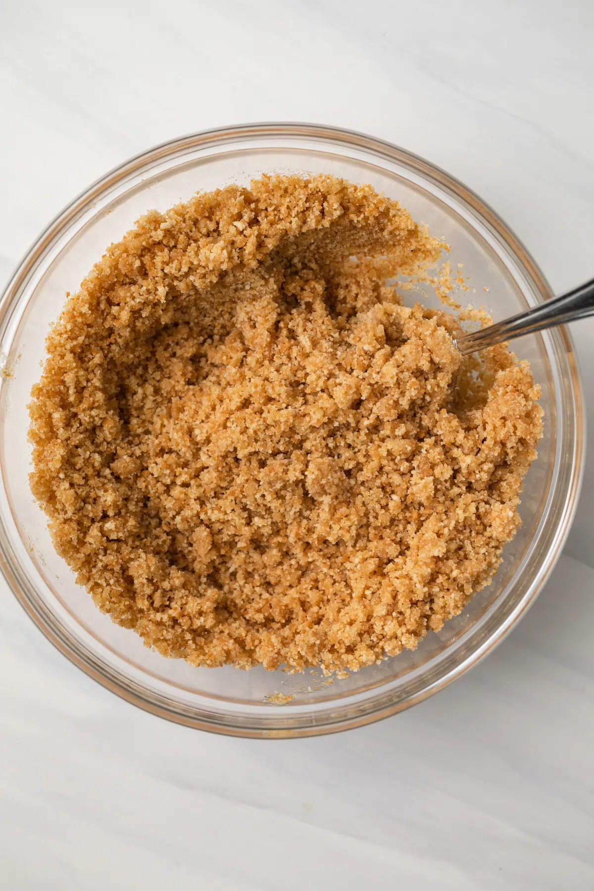 Vanilla wafer crumbs in glass bowl.