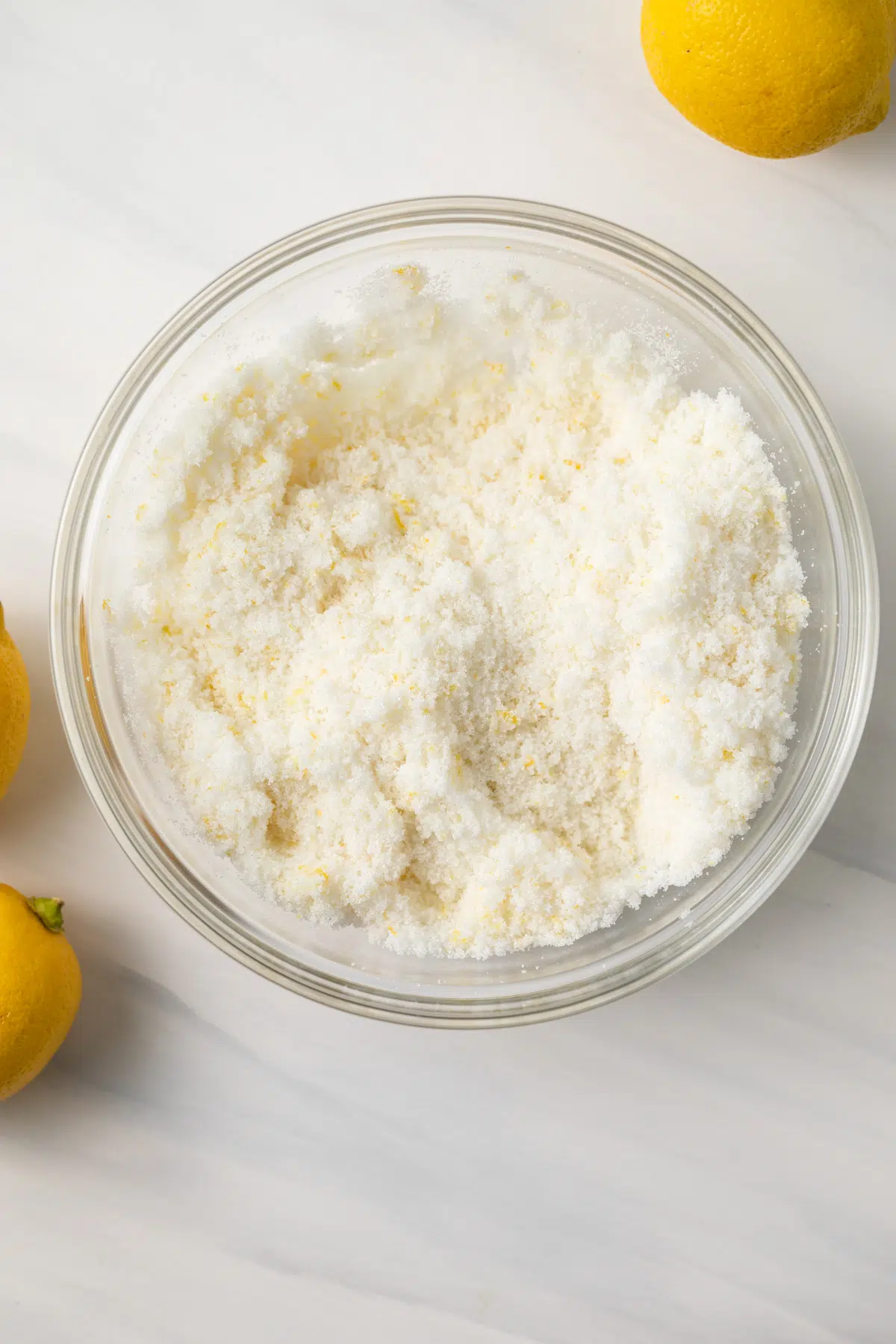 Lemon sugar in glass bowl.