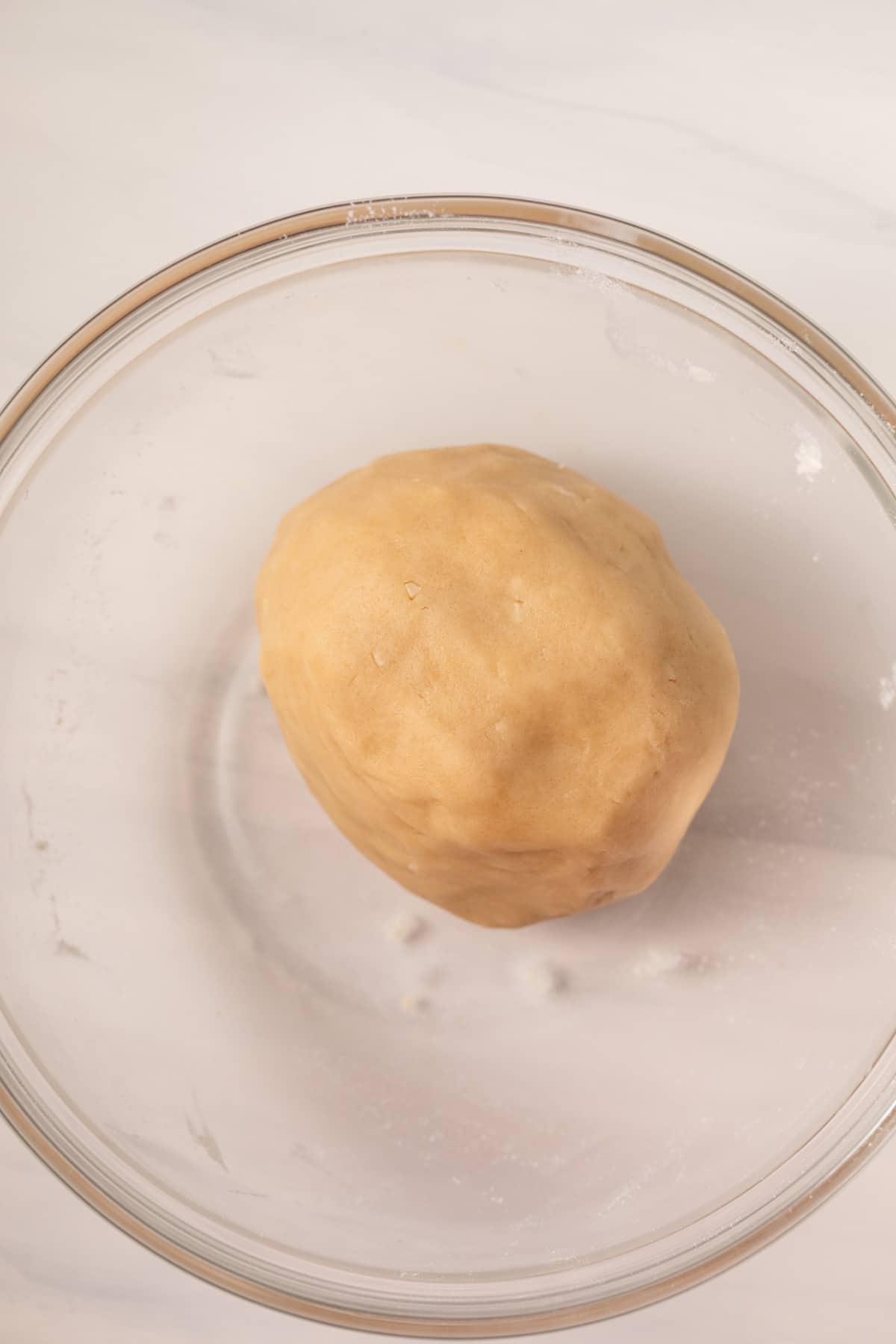 Shortbread dough in a ball.